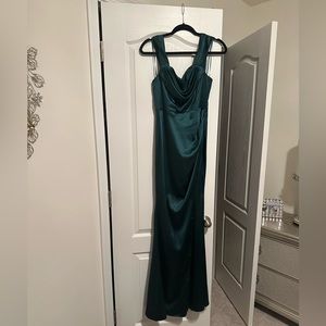 Beautiful fitted green evening gown.